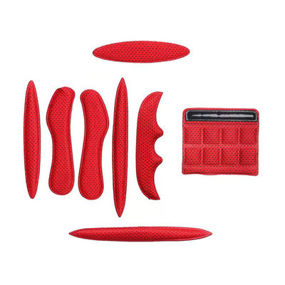 El casco rojo de la bici de la buena elasticidad rellena dureza fuerte respirable el presionar caliente